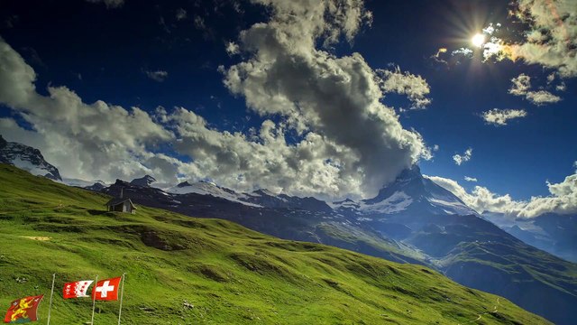 Stock Video - A beautiful sunny day timelapse in the Swiss Alps - Stock Video Footage