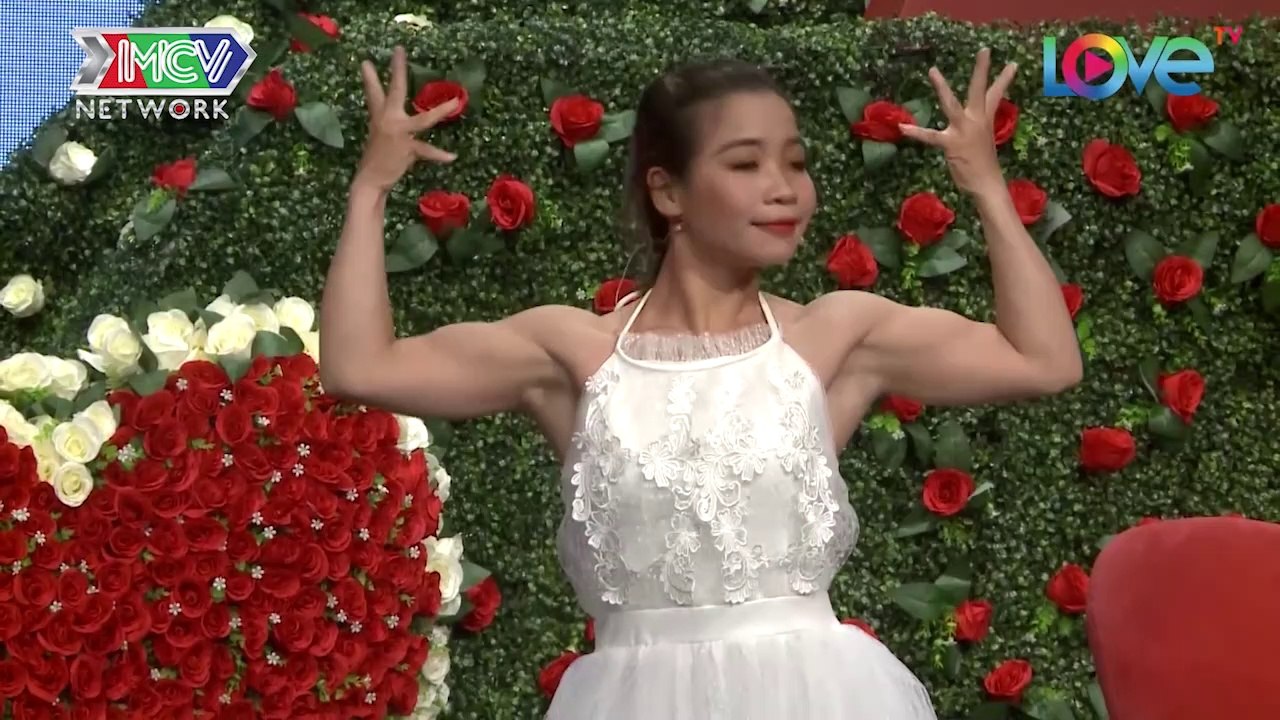 The man feels shocked with the girl's bodybuilding