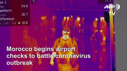 Moroccan health workers scan passengers arriving to airport amid virus fears