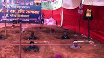 Indian farmers plant themselves neck-deep in soil to protest government land seizure