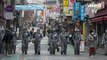 Des soldats désinfectent les rues de Séoul, 142 nouveaux cas en Corée du Sud