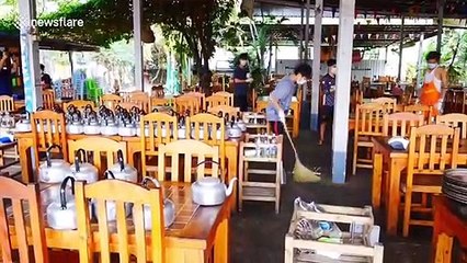 Thai cleaners disinfect restaurant used by worker who returned from coronavirus hot-spot South Korea