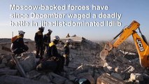 Syria rescue workers sift through rubble after deadly air strikes in Idlib
