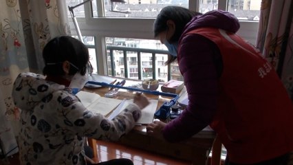 Volunteers take care of families of frontline medical workers fighting the coronavirus in China