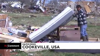 Tornado survivors clung to furniture to avoid being carried away