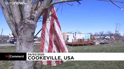 Tornado survivors clung to furniture to avoid being carried away