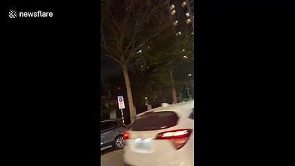 Driver reverse into ridiculously small space at market in Taiwan