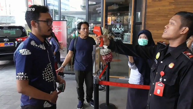 Indonesian shopping centre checks temperature of every visitor to scan for coronavirus symptoms