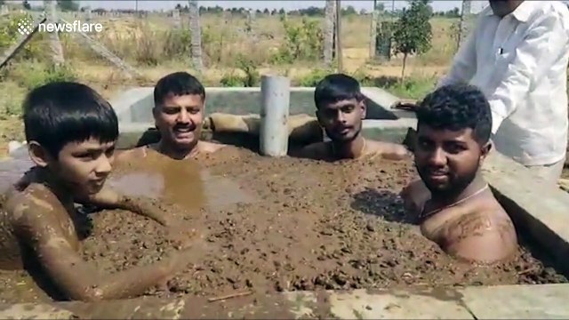 To protect themselves from coronavirus these Indians are bathing in cow dung