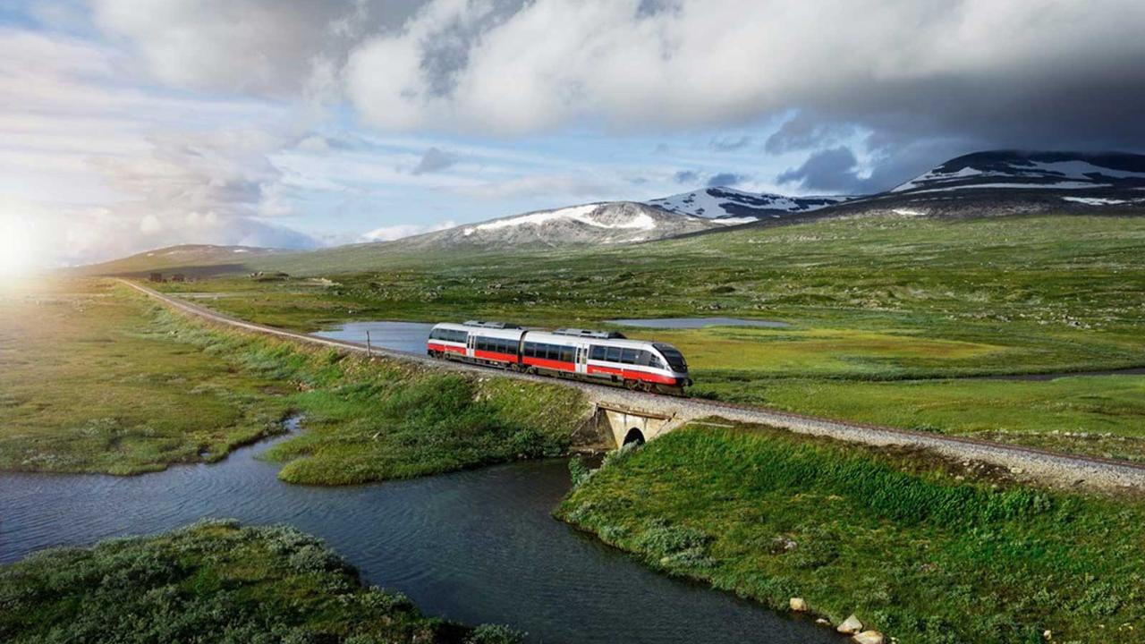 Enjoy Fjords, Arctic Landscapes, and the Midnight Sun on This Arctic Circle Express Train Tour