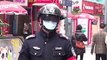 Chinese police wear helmets fitted with infrared device to detect pedestrians' temperature amid coronavirus outbreak