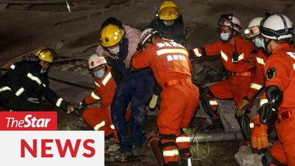 下载视频: Ten die and 23 still trapped in collapsed China hotel