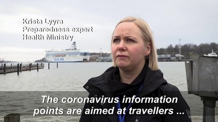 Coronavirus information posters set up at Helsinki harbour, Europe's busiest passenger port