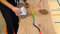 These river tables are made with melted crayons