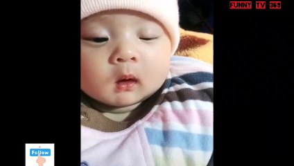 Baby with angel smile when sleeping