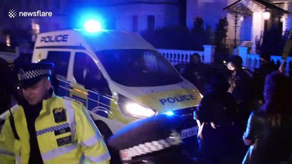 Protesters block police van during anti-fascist rally outside Greek Embassy in London