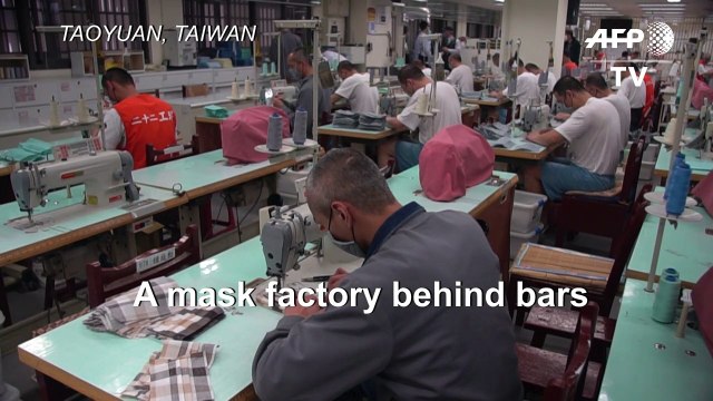 Taiwan inmates make face masks after virus outbreak