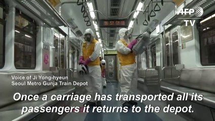 Coronavirus: Workers disinfect Seoul trains