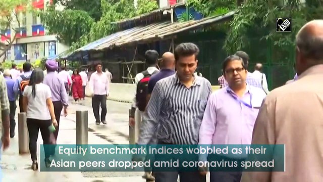 Equity indices flat in volatile trading, Yes Bank jumps 20 pc