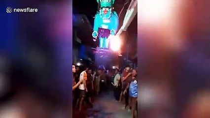 Mumbai people burn effigy of 'coronavirus monster' during Holi festival