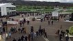 Cheltenham Festival-goers use hand sanitiser stations as crowd numbers down due to coronavirus concerns