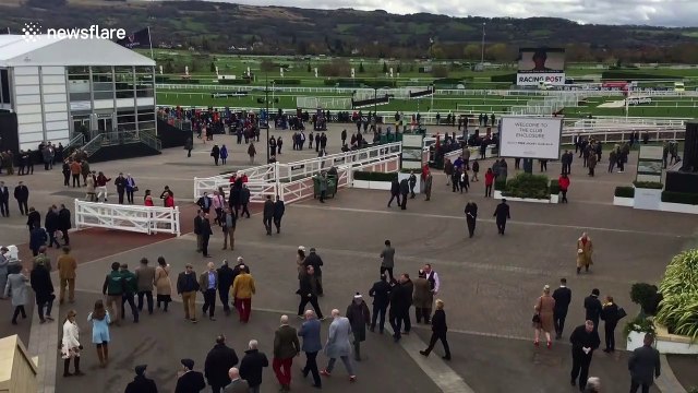 Cheltenham Festival-goers use hand sanitiser stations as crowd numbers down due to coronavirus concerns