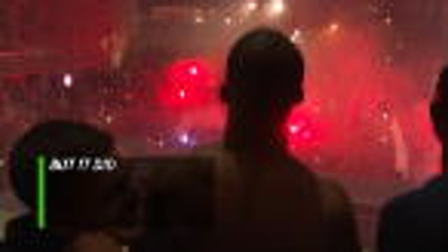 PSG players celebrate with fans outside Parc des Princes