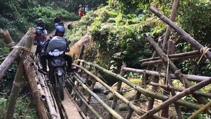Myanmar's doctors on motorbikes trek dangerously to reach patients
