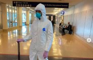 Naomi Campbell wears hazmat suit through LAX airport