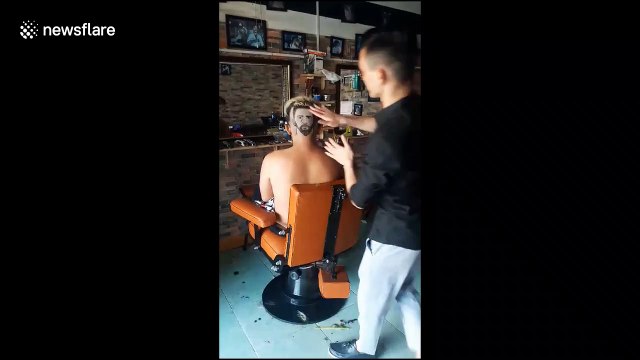 Barber shaves Lionel Messi's face into the hair of football fanatic