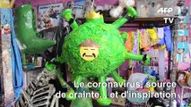 Un artisan mexicain fabrique une piñata en forme de virus