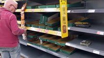 Supermarket shelves running empty