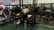 Guy Fails to Balance Weights on Rod While Trying to do Squats in Gym