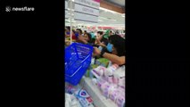 Coronavirus: Chaos at supermarket in Manila as locals panic buy hand sanitizer