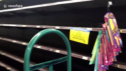 Coronavirus: Shelves cleared out in LA as panic buying sets in