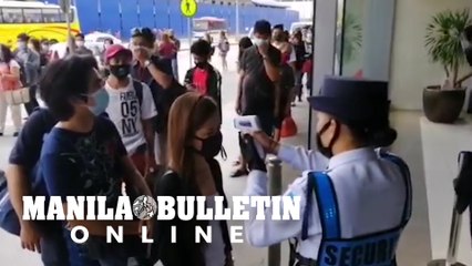 Line of commuters is seen outside PITX