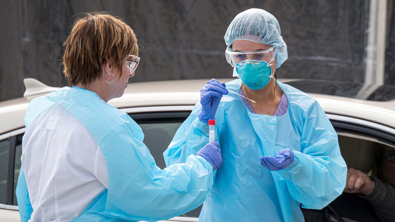 Disease expert tells Americans to ‘hunker down’ as US tightens coronavirus measures