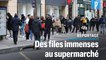 Coronavirus : de longues files d'attente devant les supermarchés parisiens
