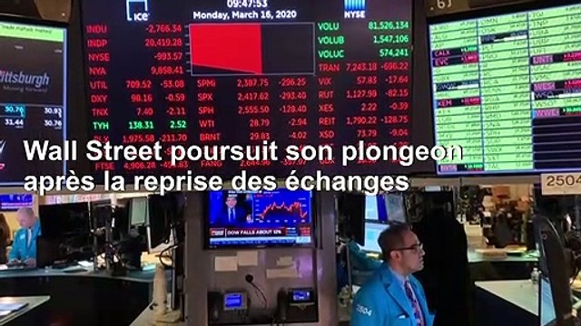 Coronavirus: les traders s'affairent alors que Wall Street poursuit son plongeon