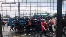 Commuters rush to ride trucks after suspension of public transportation