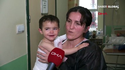 Kahraman anne alevlerin arasına dalıp minik kızını kurtardı