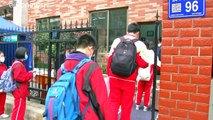 Estudantes chineses regressam à escola