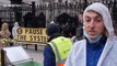 Protesters dress in hazmat suits outside Downing Street targeting UK's action during COVID-19 pandemic