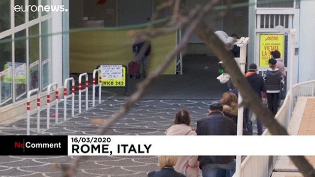 Coronavirus: Italians comply with social distancing rules outside supermarket