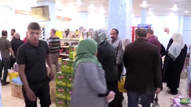 Koronavirüs nedeniyle sokağa çıkma yasağı uygulanan Kerkük'te alışveriş yoğunluğu