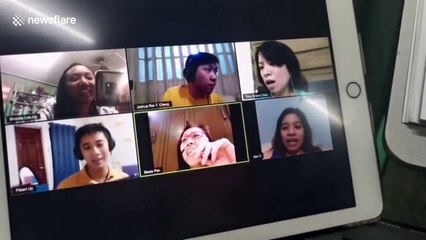 Determined Filipino choir rehearse with each other online during COVID-19 pandemic
