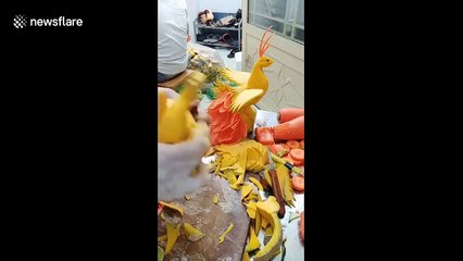 Witness this Vietnamese man sculpt 'peacock art' from pumpkin AND carrot