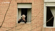 In Spain, quarantined protesters hang out of their windows banging pots and pans in anti-monarchy protest