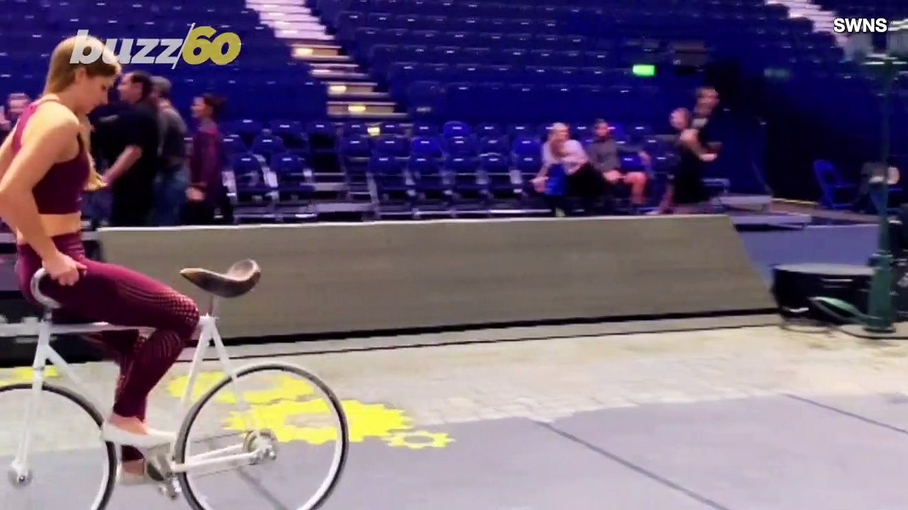 This ‘Artistic Cyclist’ Performs Unbelievable Tricks Including Handstands on a Bike