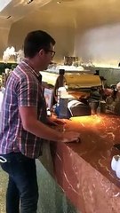 Guy Jokingly Pretends to Pay for His Coffee With Toilet Pape